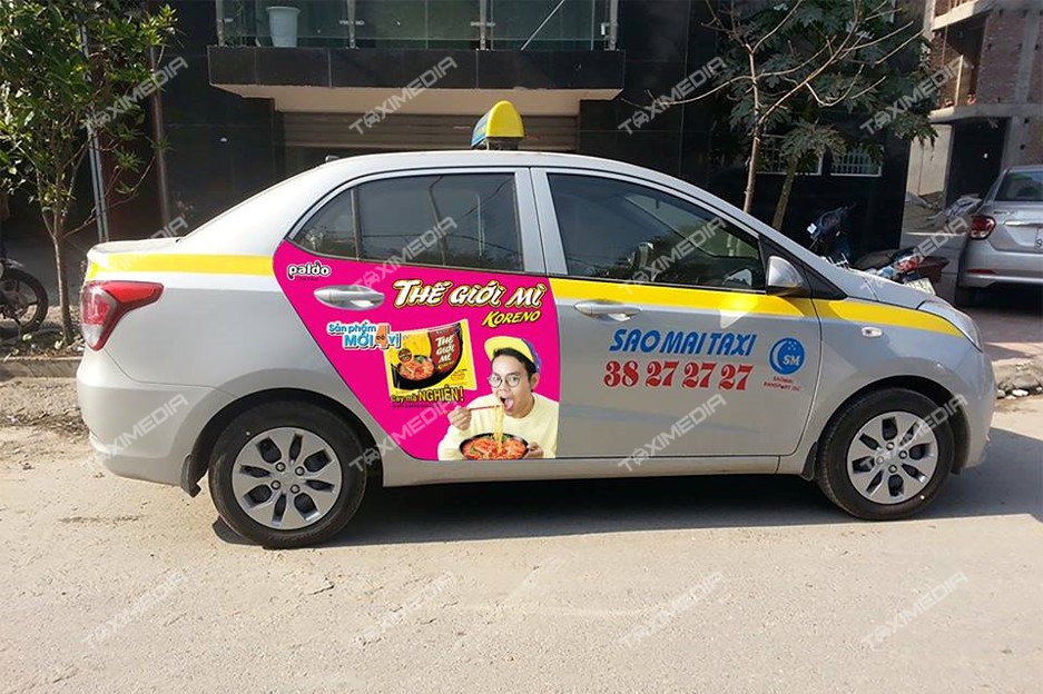 quảng cáo trên xe taxi Sao Mai