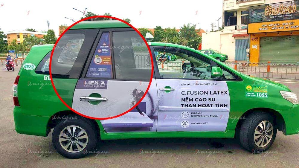 dán quảng cáo trên kính xe taxi